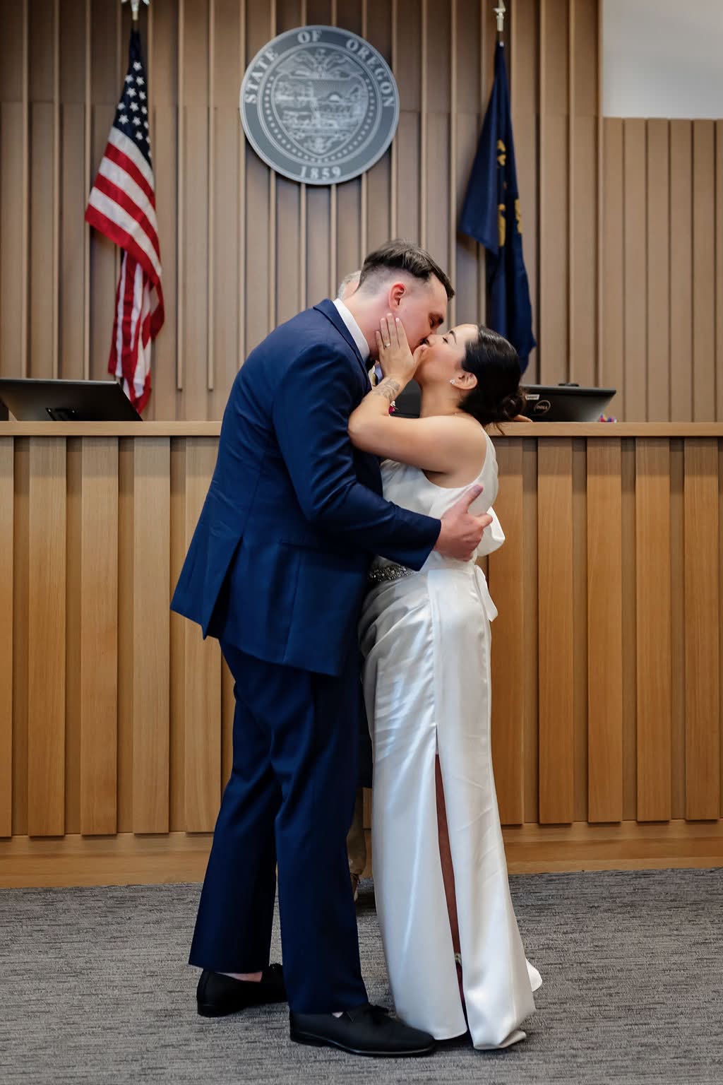 The couple's first kiss at their Oregon courthouse ceremony