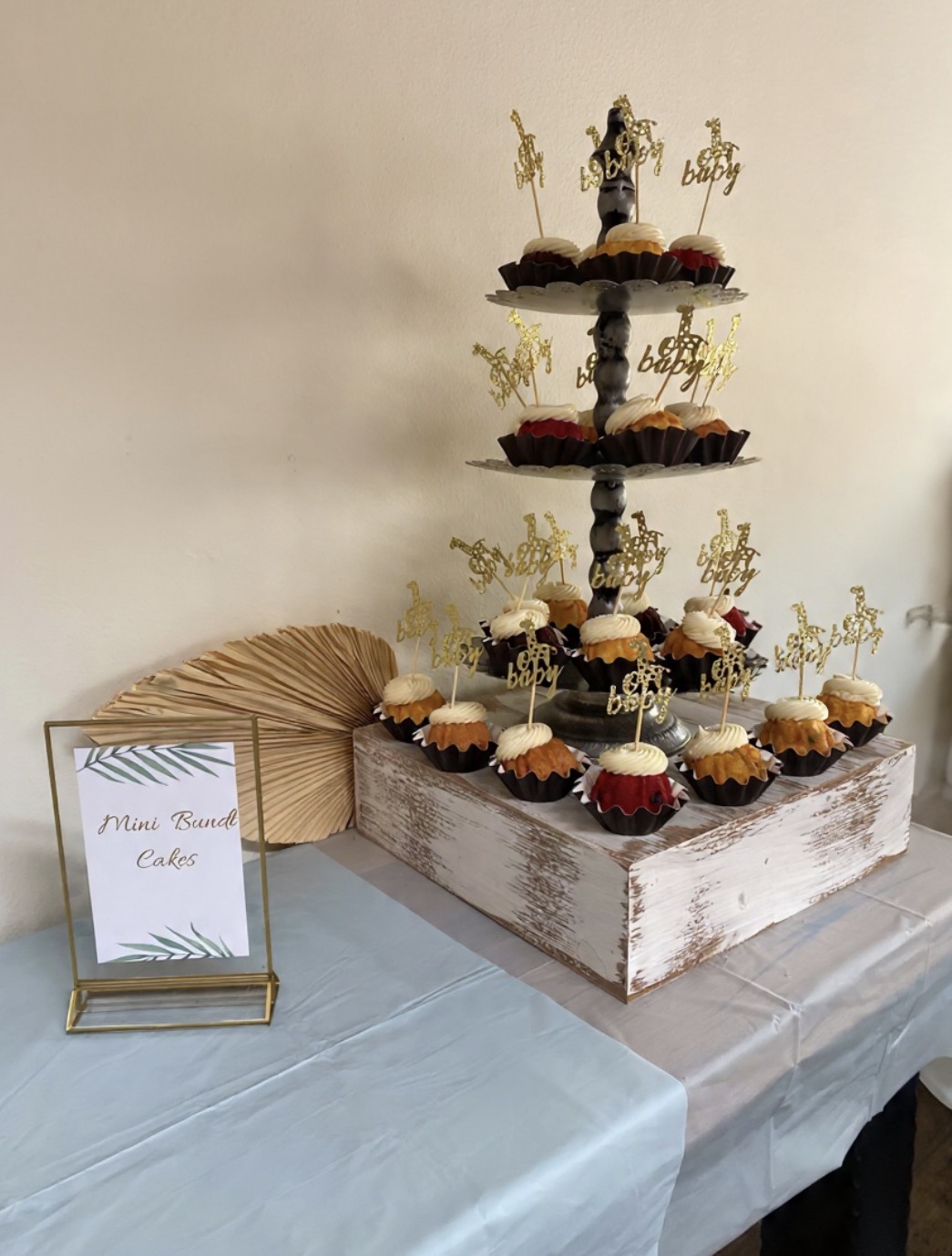 Mini bundt cake tower with baby cake toppers