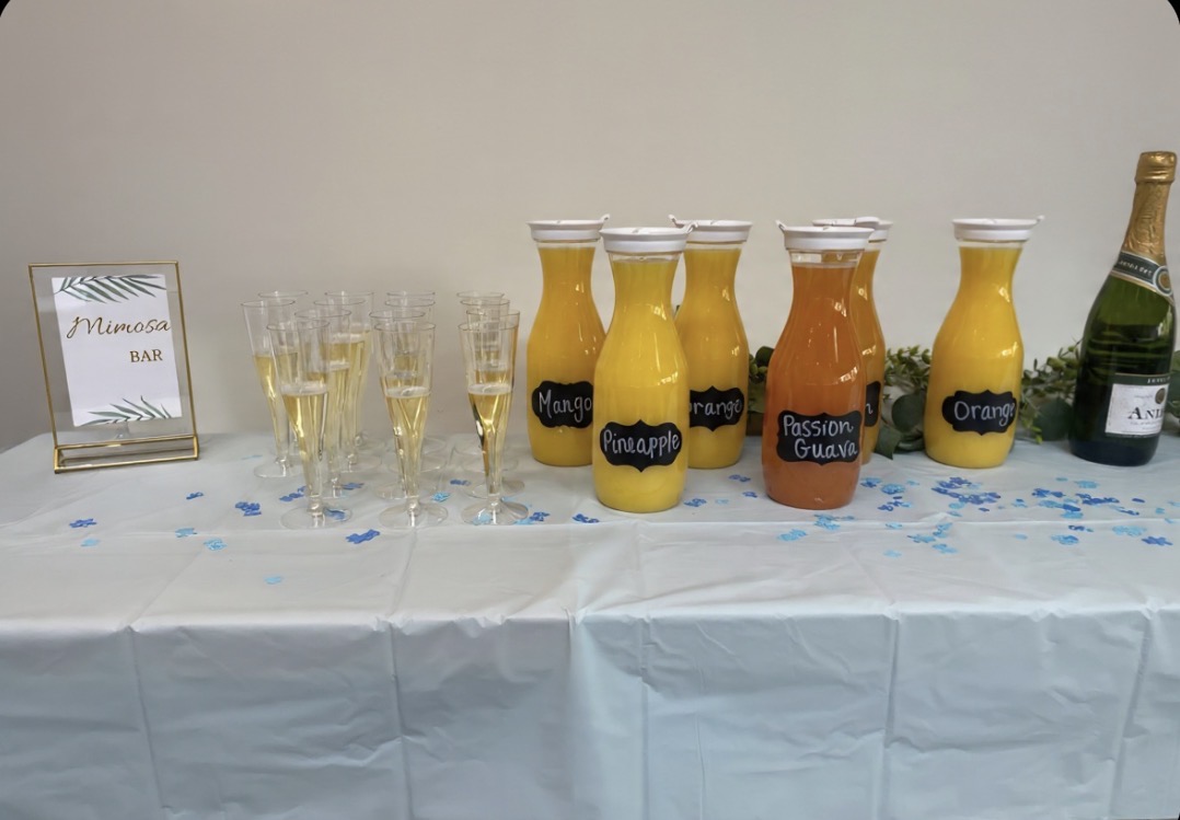Mimosa bar with mango, pineapple, orange and passion guava juices